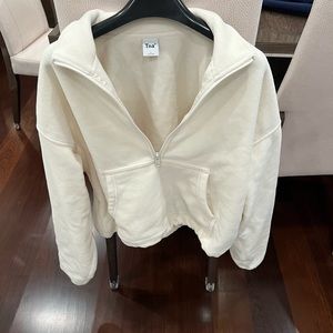 White TNA cropped fuzzy sweatshirt